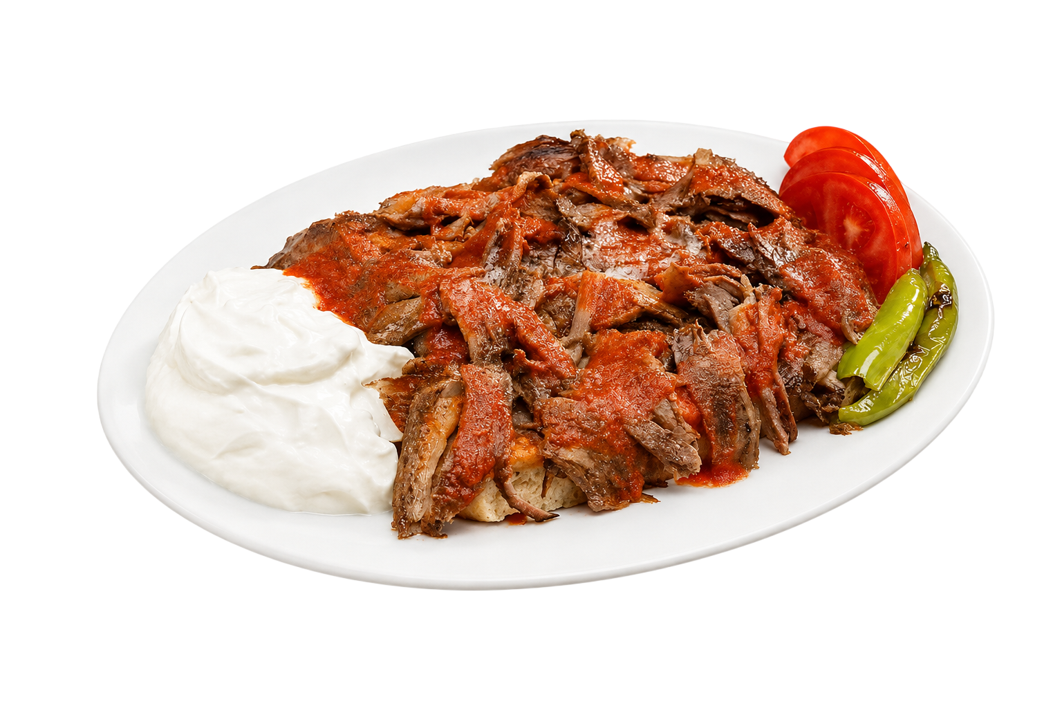 Plate of sliced meat with red sauce, yogurt, sliced tomato, and green peppers on a white plate.
